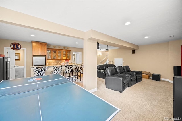 7717 S Grape Ct, Centennial, CO 80122 - playroom featuring bar with sink, carpet floors, recessed lighting, and baseboards