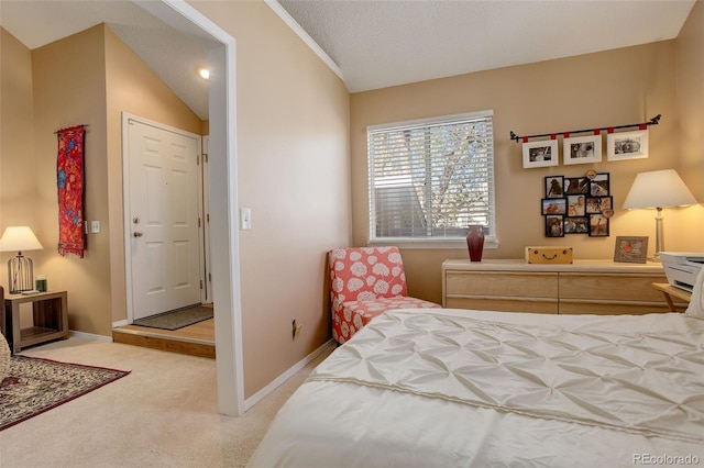 bedroom featuring carpet floors and baseboards