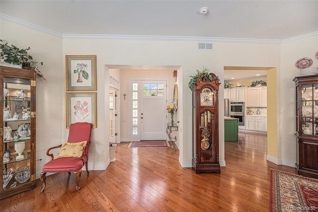 16929 W 63rd Ln, Golden, CO 80403 - entrance foyer with wood finished floors and crown molding