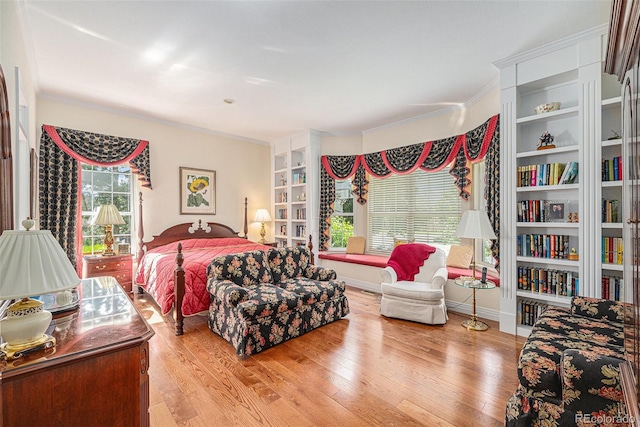16929 W 63rd Ln, Golden, CO 80403 - bedroom featuring ornamental molding and wood finished floors