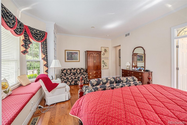 16929 W 63rd Ln, Golden, CO 80403 - bedroom with wood finished floors and ornamental molding