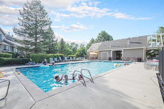 16929 W 63rd Ln, Golden, CO 80403 - community pool featuring a patio area