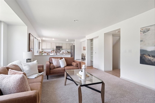 20396 E Berry Pl, Centennial, CO 80015 - living area with light colored carpet and recessed lighting