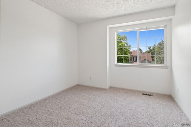 20396 E Berry Pl, Centennial, CO 80015 - empty room with carpet flooring and a textured ceiling
