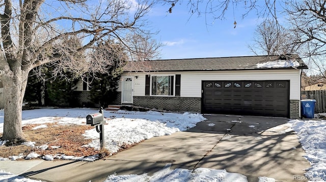 ranch-style house featuring a garage