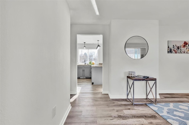 hall featuring light wood-type flooring