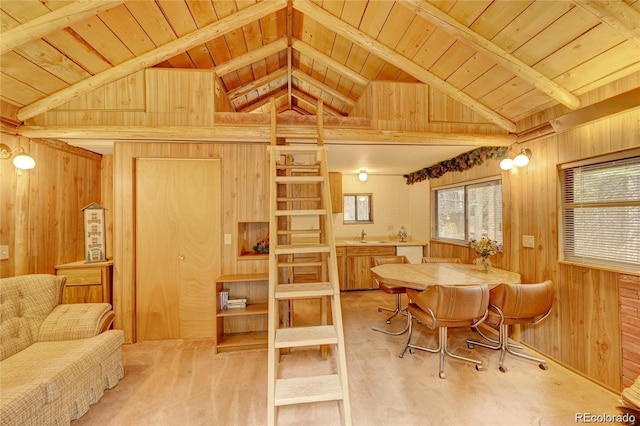 3237 Mill Creek Rd, Dumont, CO 80436 - carpeted dining space with wood walls, wood ceiling, and lofted ceiling