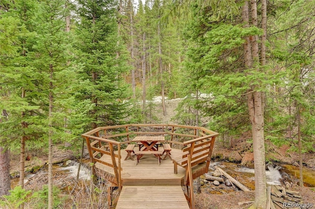 3237 Mill Creek Rd, Dumont, CO 80436 - wooden terrace with a view of trees