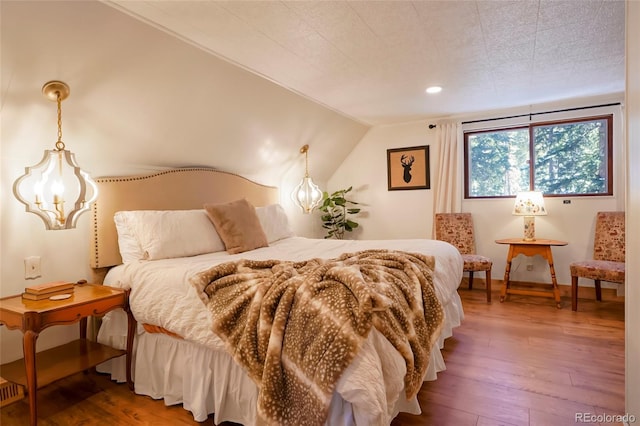 3237 Mill Creek Rd, Dumont, CO 80436 - bedroom featuring hardwood / wood-style flooring, vaulted ceiling, and recessed lighting