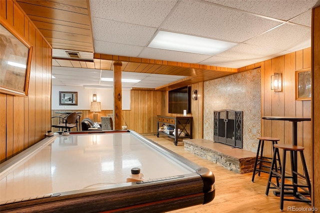 3237 Mill Creek Rd, Dumont, CO 80436 - rec room featuring wood walls, wood finished floors, and a paneled ceiling