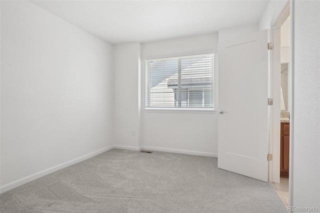 1743 Spring Water Pt, Colorado Springs, CO 80908 - spare room with light carpet and baseboards