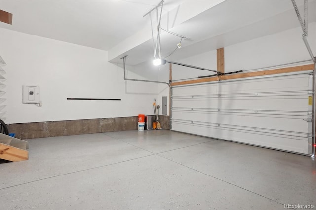 1743 Spring Water Pt, Colorado Springs, CO 80908 - garage featuring a garage door opener and electric panel