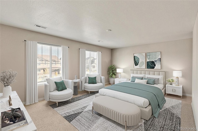 carpeted bedroom featuring a textured ceiling