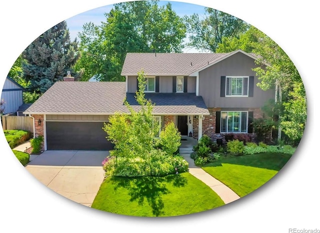 7335 S Milwaukee Way, Centennial, CO 80122 - view of front of house featuring an attached garage, driveway, and brick siding