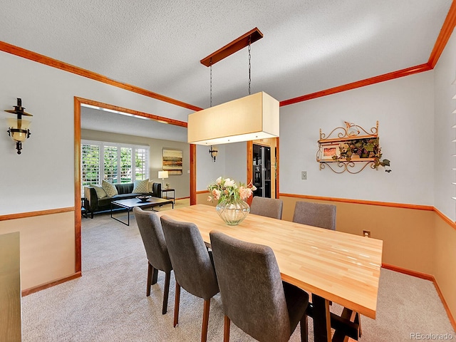 7335 S Milwaukee Way, Centennial, CO 80122 - carpeted dining room featuring ornamental molding and a textured ceiling