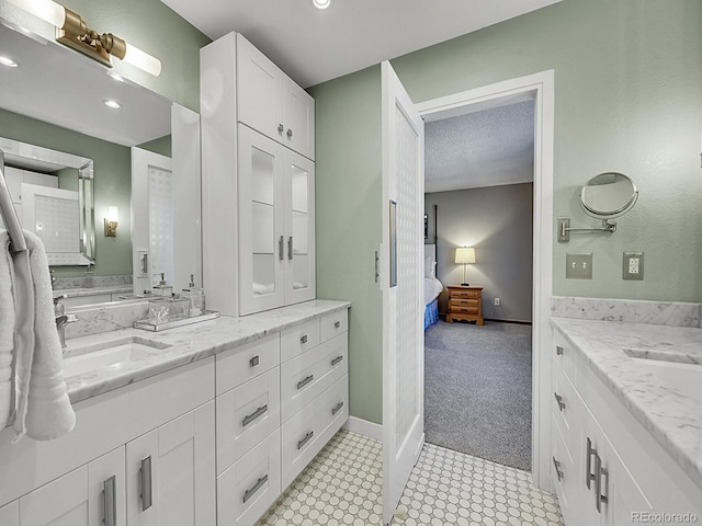 7335 S Milwaukee Way, Centennial, CO 80122 - ensuite bathroom with vanity and recessed lighting