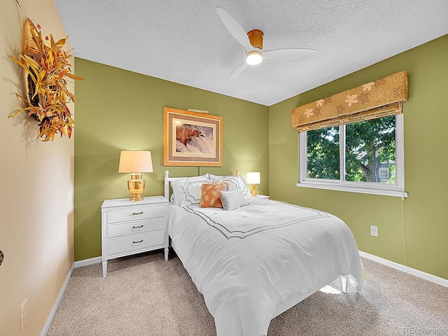 7335 S Milwaukee Way, Centennial, CO 80122 - carpeted bedroom featuring a textured ceiling and a ceiling fan
