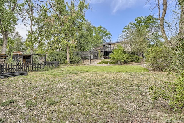 view of yard with a wooden deck