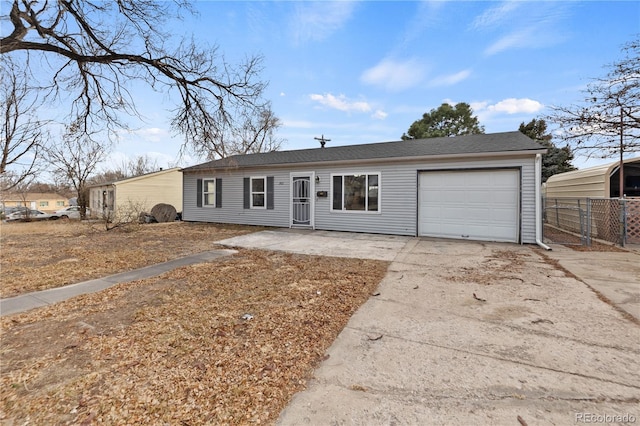 ranch-style house featuring a garage