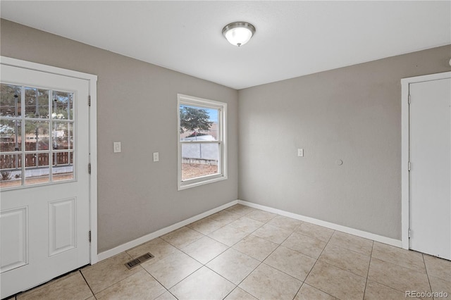 interior space with light tile patterned flooring