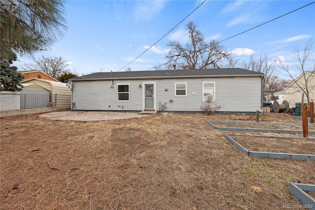 back of property featuring cooling unit