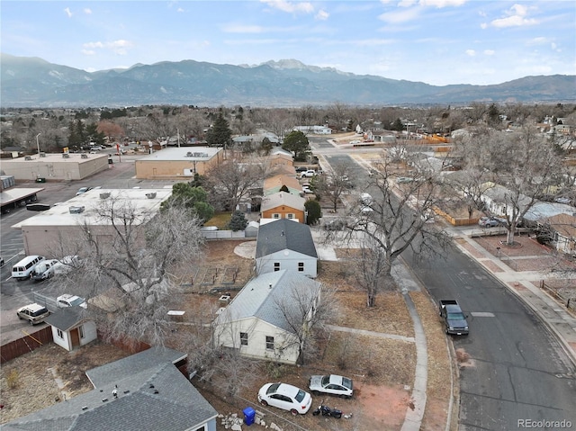 birds eye view of property with a mountain view