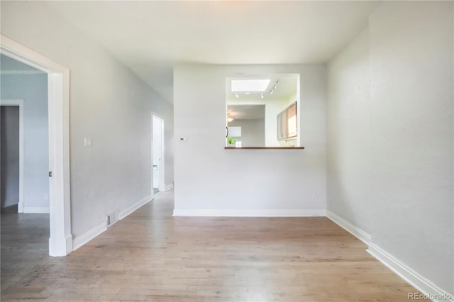 22 E Bayaud Ave, Denver, CO 80209 - spare room featuring light wood-type flooring