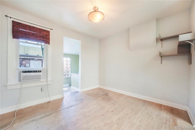 22 E Bayaud Ave, Denver, CO 80209 - empty room featuring wood finished floors