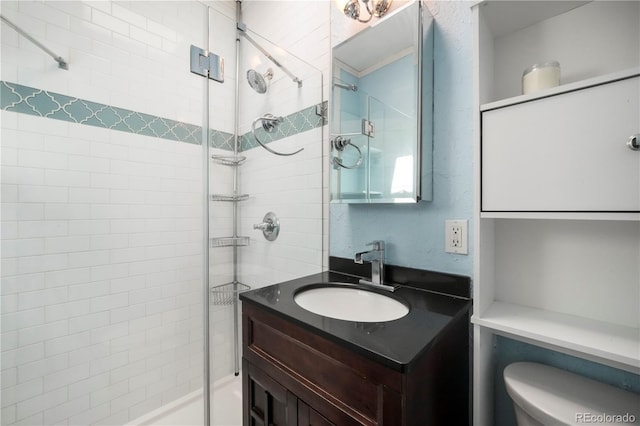 22 E Bayaud Ave, Denver, CO 80209 - bathroom featuring a stall shower and vanity