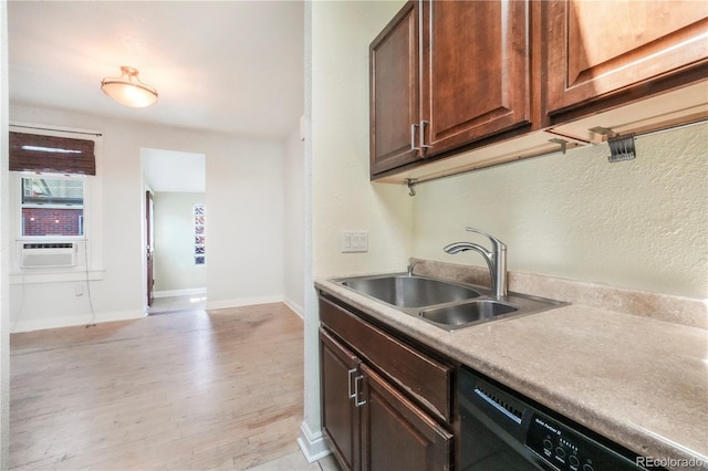 22 E Bayaud Ave, Denver, CO 80209 - kitchen with dishwasher, light wood-type flooring, light countertops, cooling unit, and dark brown cabinets