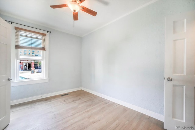 22 E Bayaud Ave, Denver, CO 80209 - unfurnished room featuring ceiling fan and light wood-style floors