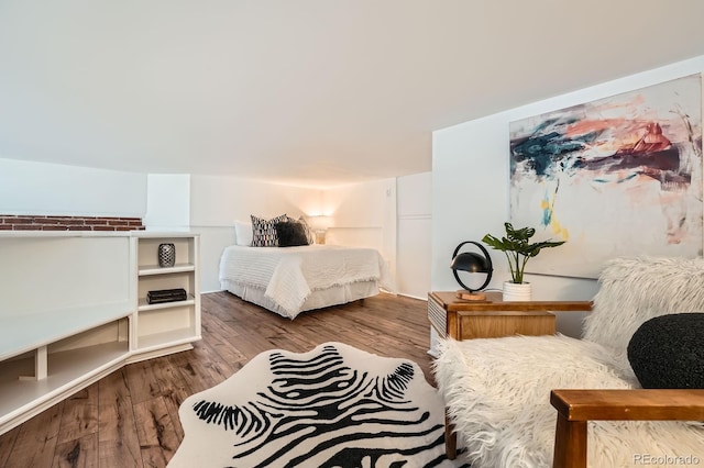 bedroom with wood finished floors