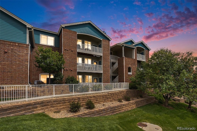 view of outdoor building at dusk