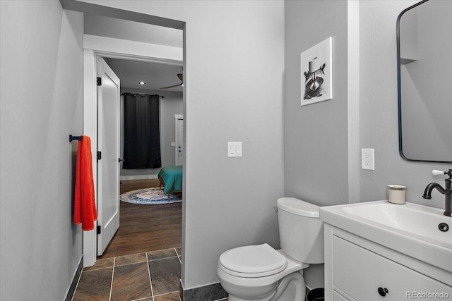 813 E B St, Pueblo, CO 81003 - bathroom with vanity and toilet