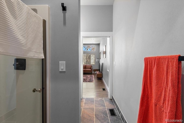 813 E B St, Pueblo, CO 81003 - hall featuring dark tile patterned flooring