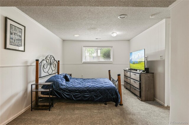8410 Gray St, Arvada, CO 80003 - bedroom featuring carpet, crown molding, and a textured ceiling