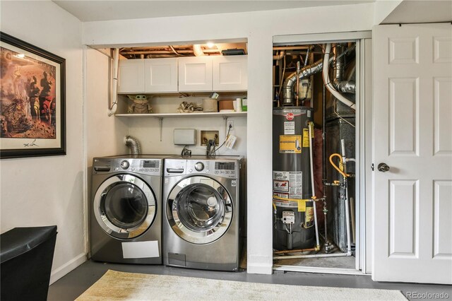 8410 Gray St, Arvada, CO 80003 - laundry room featuring gas water heater, washing machine and dryer, and baseboards