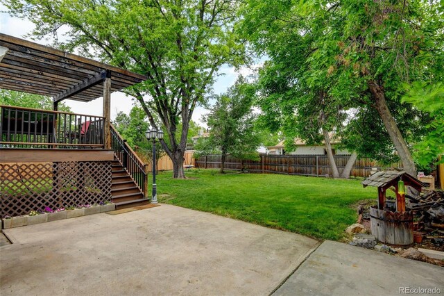 8410 Gray St, Arvada, CO 80003 - view of yard featuring a pergola, a patio, and stairway