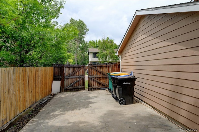 8410 Gray St, Arvada, CO 80003 - view of patio featuring a gate