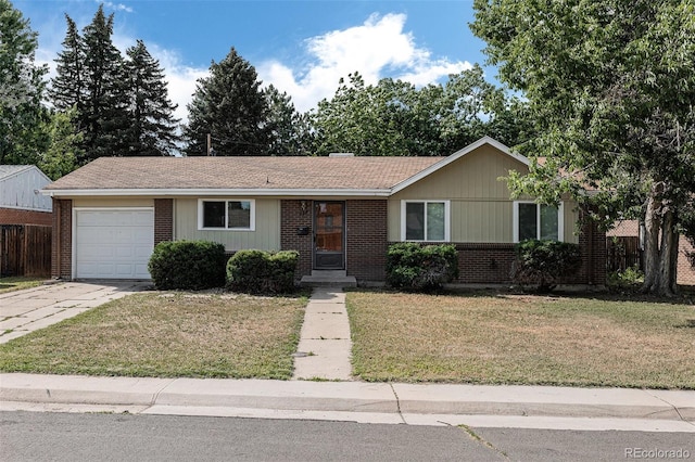 867 S Grape St, Denver, CO 80246 - ranch-style house featuring a garage, brick siding, and driveway