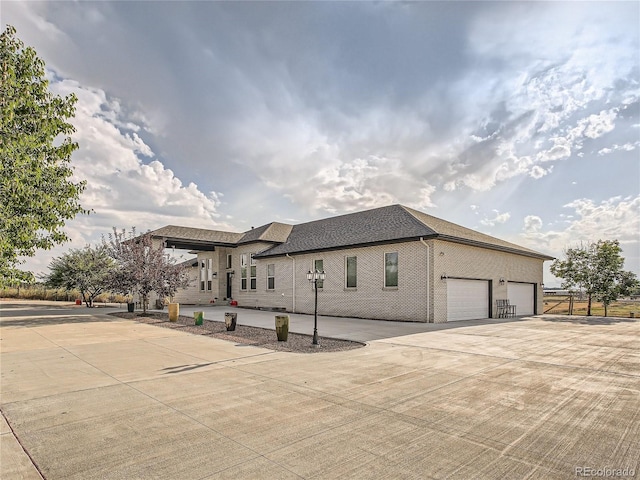 view of side of home with a garage