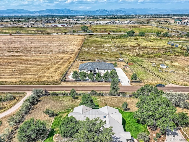 aerial view featuring a rural view and a mountain view