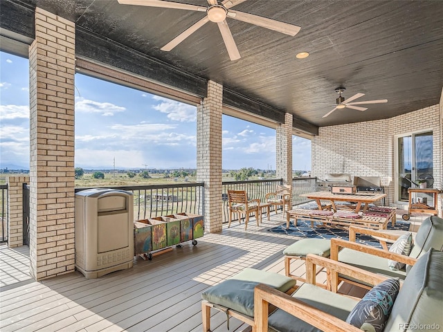 wooden terrace with ceiling fan