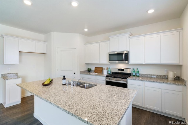 kitchen with white cabinets, sink, and stainless steel appliances