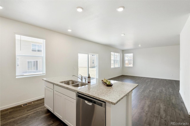 kitchen with white cabinetry, dishwasher, sink, dark wood-type flooring, and a center island with sink