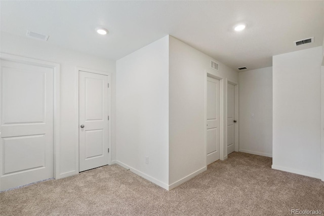 interior space with light colored carpet