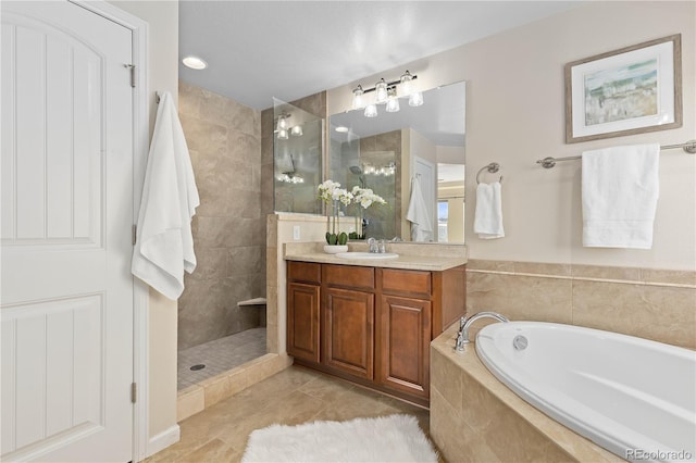 bathroom featuring vanity, separate shower and tub, and tile patterned floors