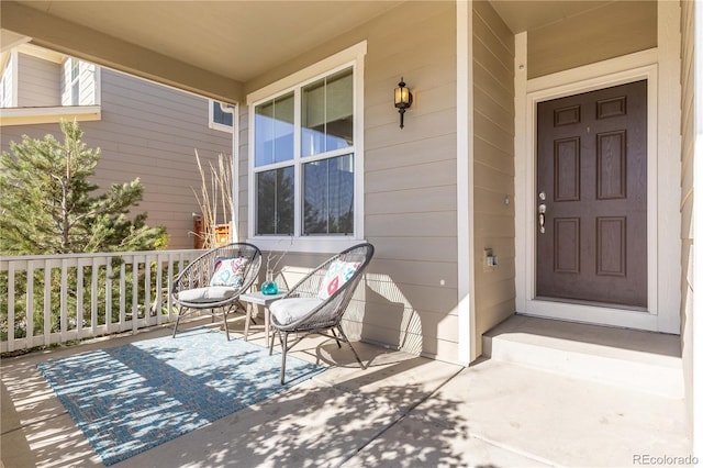 doorway to property with covered porch