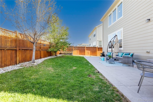 view of yard with an outdoor hangout area and a patio area