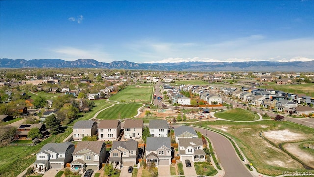 drone / aerial view featuring a mountain view